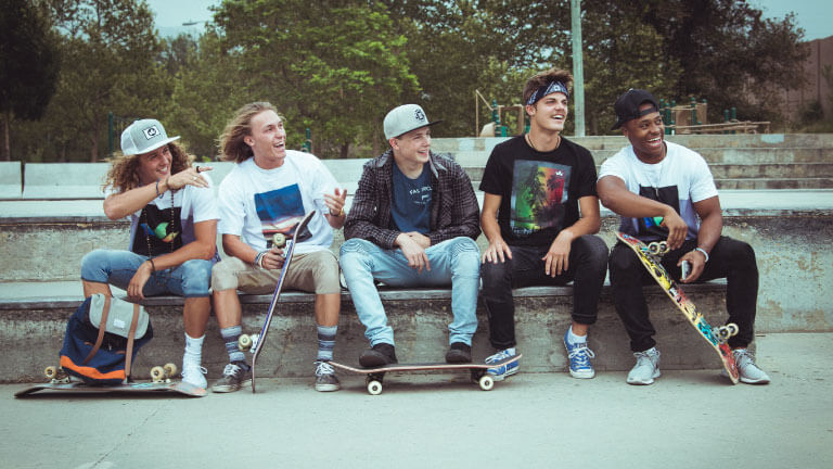 Skateboarders together at a park